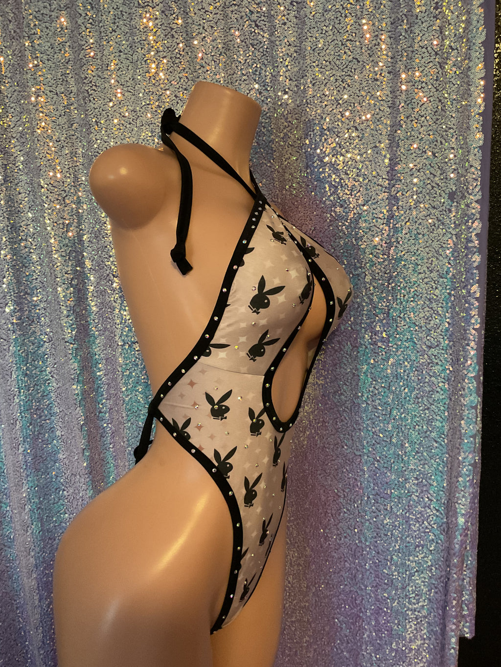 Cross front bunny one piece