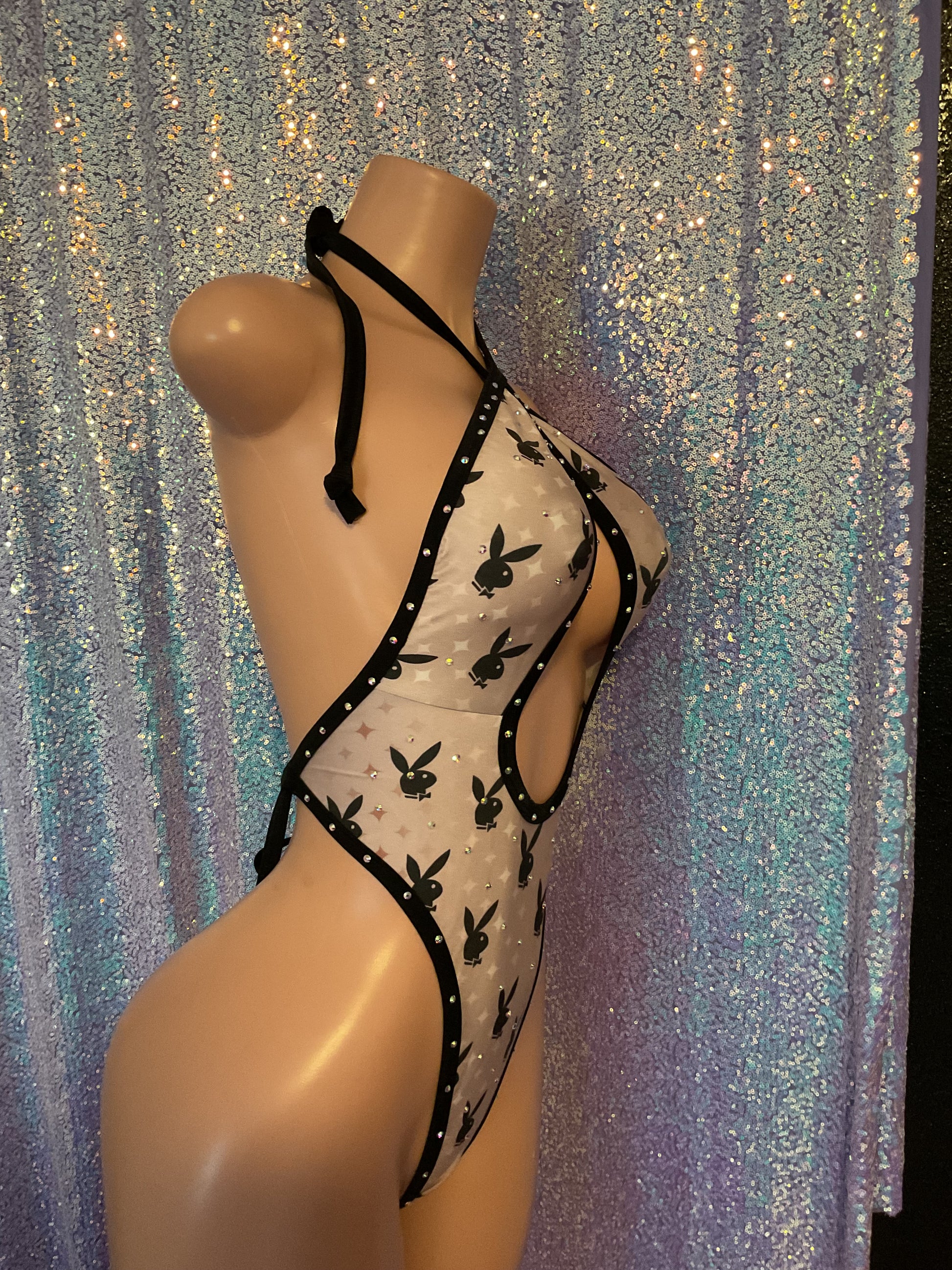 Cross front bunny one piece