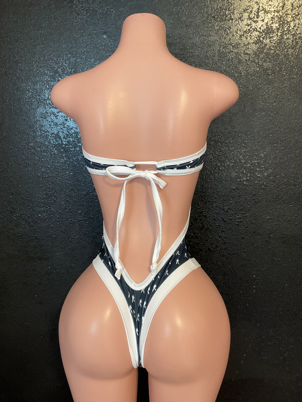 Strapless one piece thong back